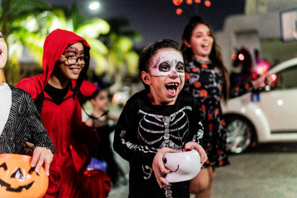 October in Encinitas: Fall by the Sea - October 18, 2025 - Visit Encinitas CA Kids dressed up for Halloween walking - Visit Encinitas CA - Discover the Coastal Charm of Encinitas